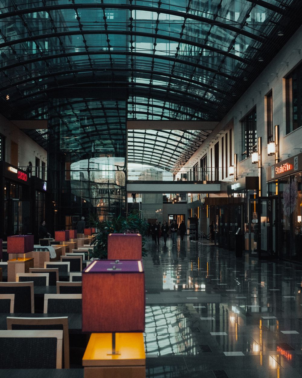 Modern shopping mall interior with a glass ceiling